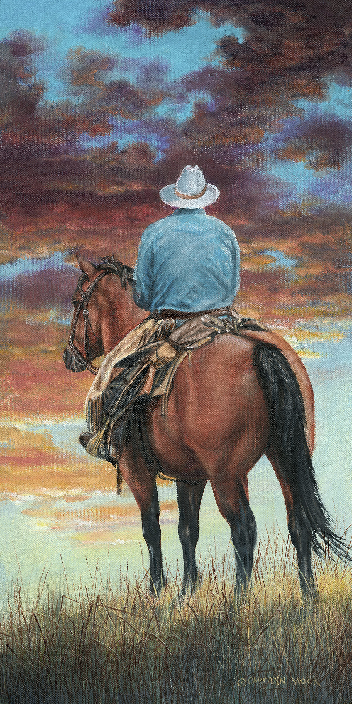 A cowboy rides into the sunset